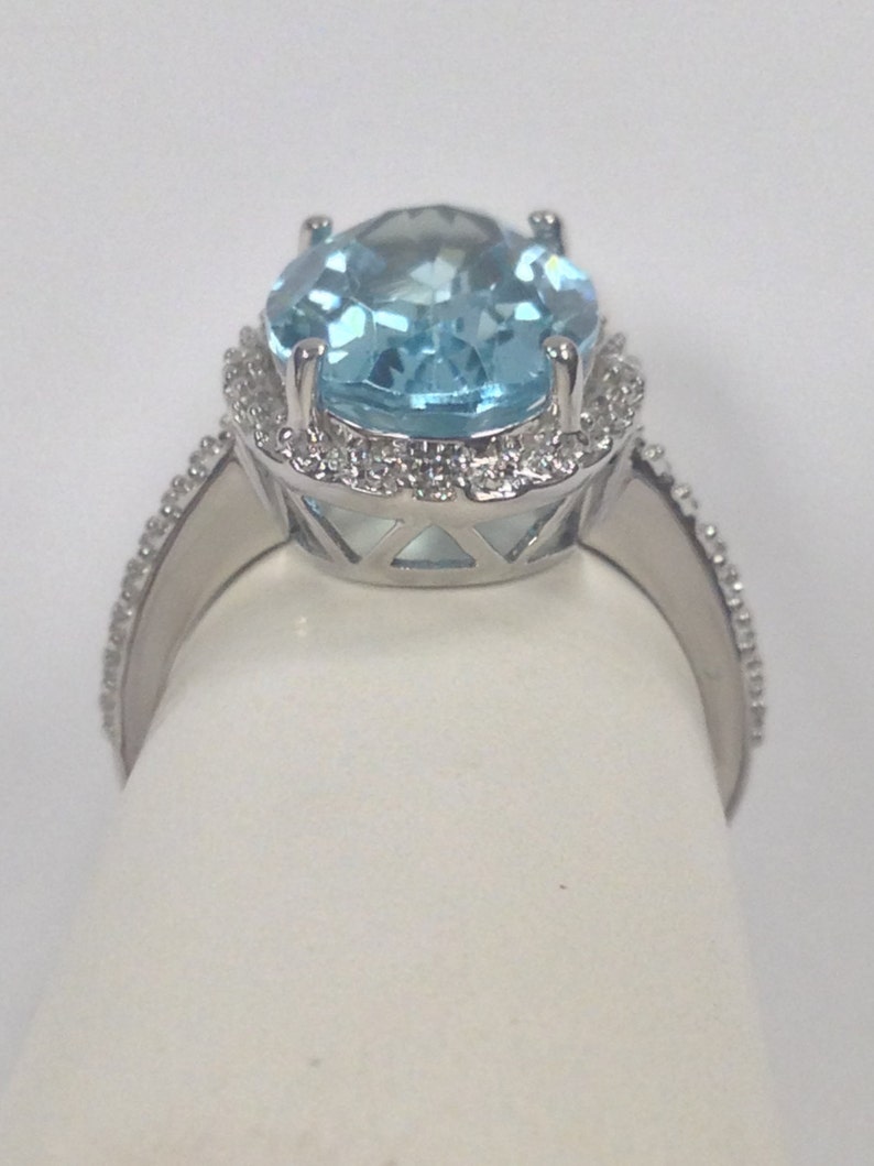 Natural Blue Topaz with Natural Diamond Ring in 925 Sterling Silver