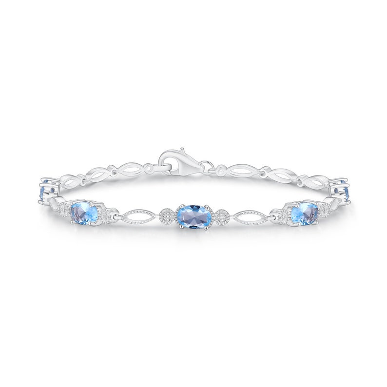 Blue Topaz Bracelet Made with Rhodium Plated Brass December Birthstone