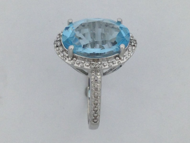 Natural Blue Topaz with Natural Diamond Ring in 925 Sterling Silver
