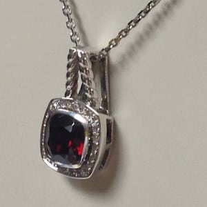Garnet with Diamond Pendant in Sterling Silver