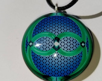 ORGONE EMERALD ONENESS on Blue Flower of Life Background