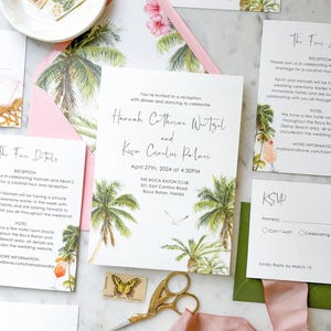 May include: A wedding invitation suite featuring palm tree illustrations, pink envelope liners, and RSVP cards. The main invitation displays the text Hannah Catherine Weitzel and Kevin Cornelius Palmer, April 27th, 2024, at 4:30PM, The Boca Raton Club.