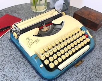 Die unvergleichliche Schreibmaschine Princess 300, 1959, QWERTY, hervorragender Zustand und alle Originalfarben. Eine der großartigsten tragbaren Schreibmaschinen!