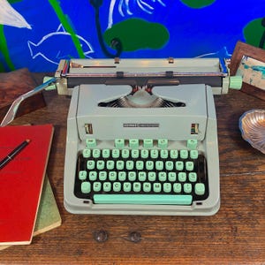The Hermes 3000 typewriter! Unusual &quot;Petit Pica&quot; font/typeface. QWERTY keyboard and an as-new platen! Type with the Finest Typewriter ever!