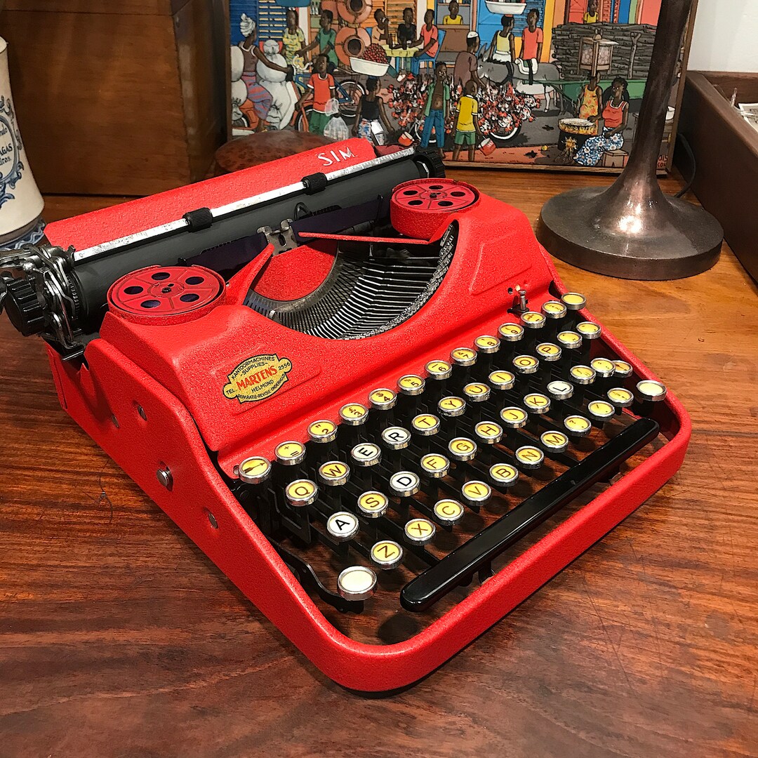 This S.I.M. Typewriter 1950 is Such Fun Yes, It's firehouse Red It's