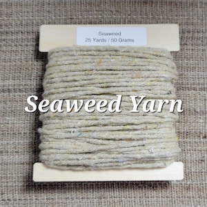 May include: A spool of beige seaweed yarn with a label that reads "Seaweed 25 Yards / 50 Grams".