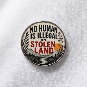 No Human Is Illegal on Stolen Land Lapel Pin – Immigration Rights Statement Jewelry