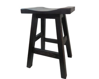 May include: A black wooden bar stool with a curved seat and a simple, sturdy design.