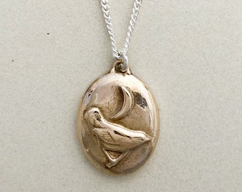 Nightingale Pendant with Crescent Moon and Cameo-Inspired Design