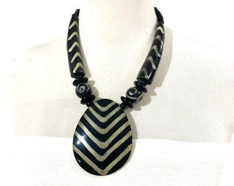 Tribal Zebra striped Horn Resin statement medallion necklace. Graphic Black & White African-Inspired Resin Statement Necklace
