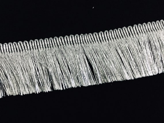 Silver tassel trim long strands