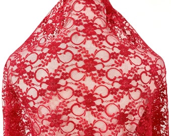 May include: Red lace fabric with a floral pattern. The lace is delicate and has a soft, flowing texture.