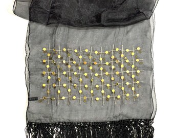 The Black Viscose Organza Shawl with Gold Hand Embroidery with long hand made fringes for all seasons.