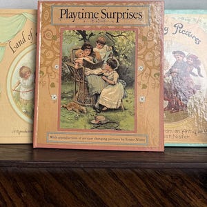 Livro infantil vintage pop-up de Ernest Nister: Terra de doces surpresas