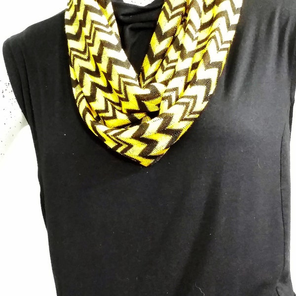 Black and gold chevron pattern on a very lightweight sweater knit ladies infinity scarf.  New Orleans Saints and Iowa Hawkeyes team colors.*