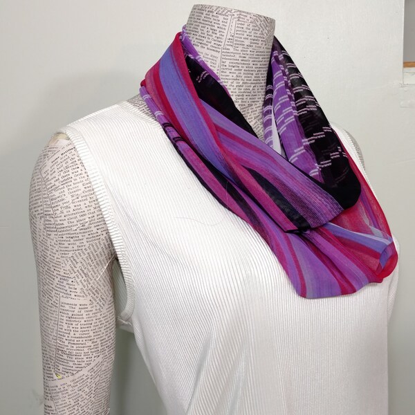 Red and purple abstract print scarf with black accents.  Great for RED HAT ladies!  Crinkle chiffon Great drape. Classy, Professional Fun!*