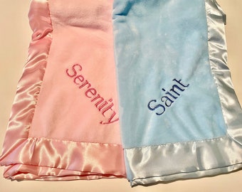 Personalized embroidered baby blanket with satin trim