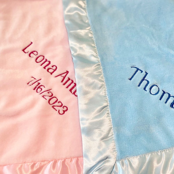 Personalized embroidered baby blanket with satin trim