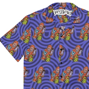 May include: A purple short-sleeved button-up shirt with a repeating pattern of orange, green, and blue cartoon characters. The text "SORRYSFARTWOP" is printed on the collar.
