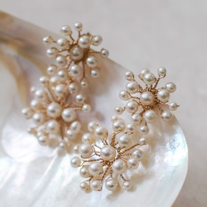 Pendientes de flor de perla hechos a mano: diseño de estrella nupcial