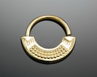 May include: Gold hoop earring with a textured, half-circle design. The hoop is open and has a smooth, polished finish.
