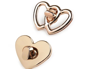 Heart-shaped swivel bag clasp in rose gold metal