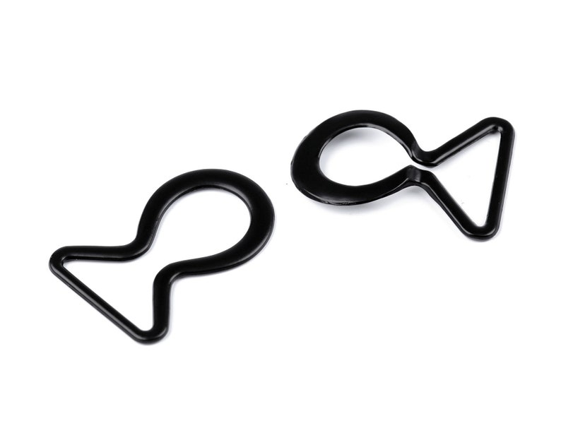 May include: Two black plastic D-ring clasps, each with a loop on one end and a triangular shape on the other.