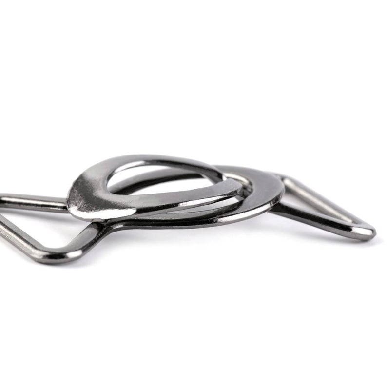 May include: A silver metal slider buckle with a triangular shape and a rounded opening. The buckle is designed for attaching straps or belts.