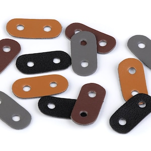4 Tappo a due fori in pelle ecologica 16x34mm / nero, marrone, grigio / ferma fermacavo doppio, chiusura a cordino, rondella in pelle