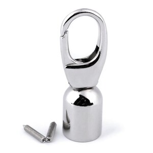 May include: Silver swivel hook with a round base and two screws. The hook is designed for attaching to a bag or other object.