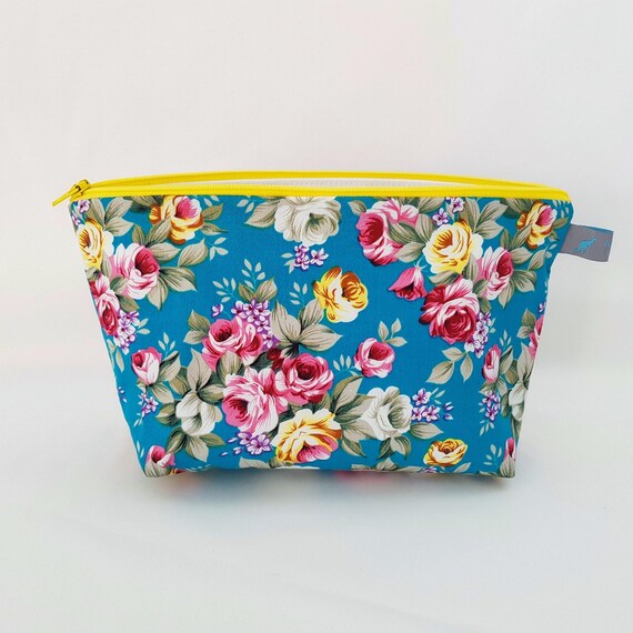 Bright floral cosmetic / wet bag with waterproof lining
