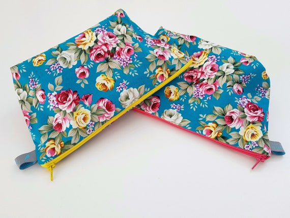 Bright floral cosmetic / wet bag with waterproof lining