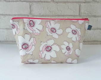 Makeup bag, cosmetic bag,toiletry bag in magnolia flower design, waterproof lining