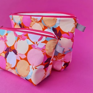 Cosmetic Makeup Bag in pink clementine fruit design: 100% cotton, waterproof lining
