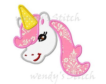 May include: Embroidered applique design of a white unicorn with a pink mane and tail, a yellow horn, and brown eyes. The unicorn is smiling.