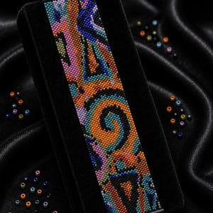 May include: A bracelet bead pattern PDF featuring a colorful peyote stitch design with orange, blue, pink, and black Miyuki Delica 11/0 beads. The text reads Bracelet Bead Pattern, PDF, Instant Download, PEYOTE STITCH, Miyuki Delica 11/0, Color Chart, Word Chart.