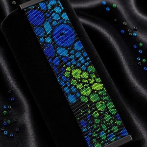 May include: A wide bracelet featuring a peyote stitch bead pattern with a gradient of blue and green circular shapes on a black background. The text reads Bracelet Bead Pattern, PDF, Instant Download, PEYOTE STITCH, Miyuki Delica 11/0, Color Chart, Word Chart.
