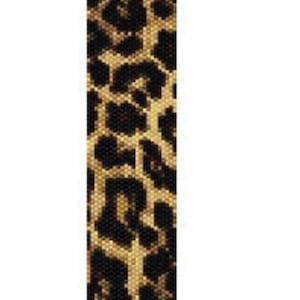 May include: A long, narrow, rectangular strip featuring a repeating leopard print pattern composed of small, individual beads. The design consists of black, dark brown, and tan spots arranged in a dense, textured grid across the entire surface.