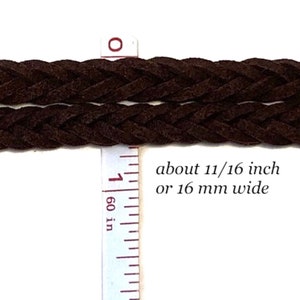 May include: Close-up of two strands of dark brown braided cord. A ruler indicates the cord is about 11/16 inch wide. The text on the image says the cord is about 11/16 inch or 16 mm wide. The cord appears to be made of suede or a similar material.
