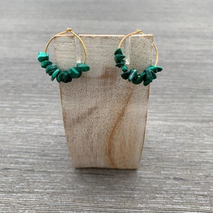 Earrings made with sterling silver and vermeil bath with green stones