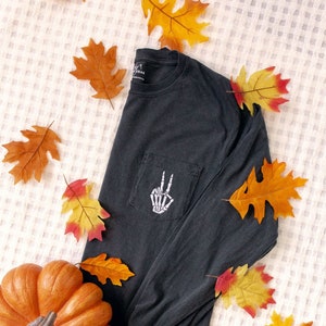 Skeleton Peace Embroidered Pocket Tee, Halloween Long Sleeve, Crewneck Sweatshirt, Spooky Scary Skeletons, Autumn Black Vintage Wash