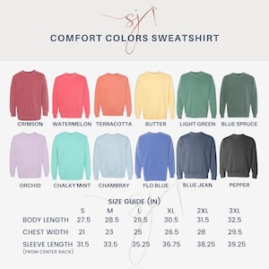 May include: A size chart for a Comfort Colors sweatshirt, showing the measurements in inches for different sizes, from small to 3XL. The chart includes body length, chest width, and sleeve length. The colours of the sweatshirts are shown in the image above the chart.