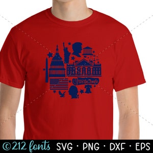 May include: Red t-shirt with a blue graphic design featuring American landmarks, including the Capitol Building, the White House, and the Statue of Liberty. The graphic also includes stars, a bald eagle, and the text "We the People".
