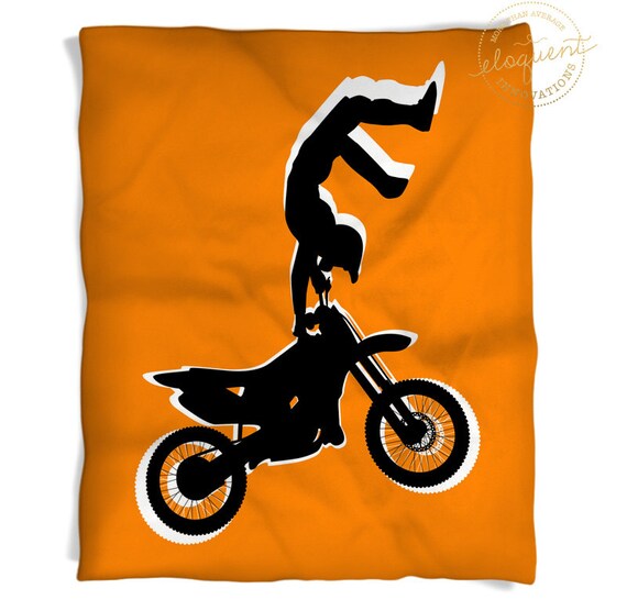 black and orange dirt bike