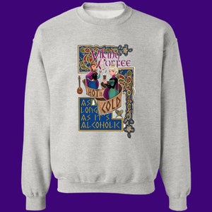 May include: A gray sweatshirt with a design featuring two cartoon women holding mugs and the text "Viking Coffee Hot or Cold As Long As It's Alcoholic".