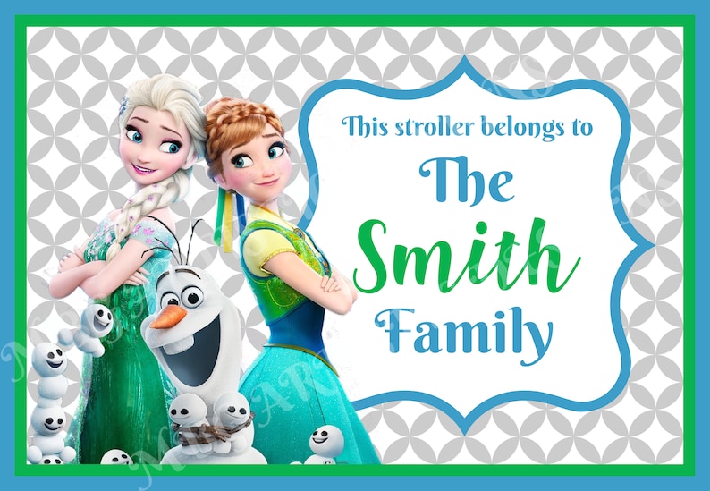 May include: A Frozen-themed stroller sign with a blue and green border. The sign features a picture of Elsa and Anna from the movie Frozen, along with Olaf. The text on the sign reads "This stroller belongs to The Smith Family".
