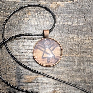 Yellowjackets Symbol Pendant: Wood Grain Fan Art Necklace