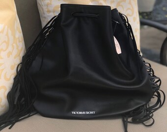black fringe backpack purse
