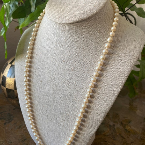 24” Quality Faux Pearl 1960’s Necklace with Nice Clasp Closure Knotted Between Each Pearl