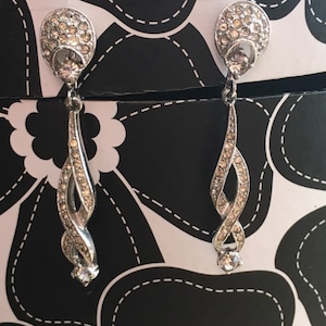 1980&#39;s Signed Policini clip on rhinestone dangle earrings